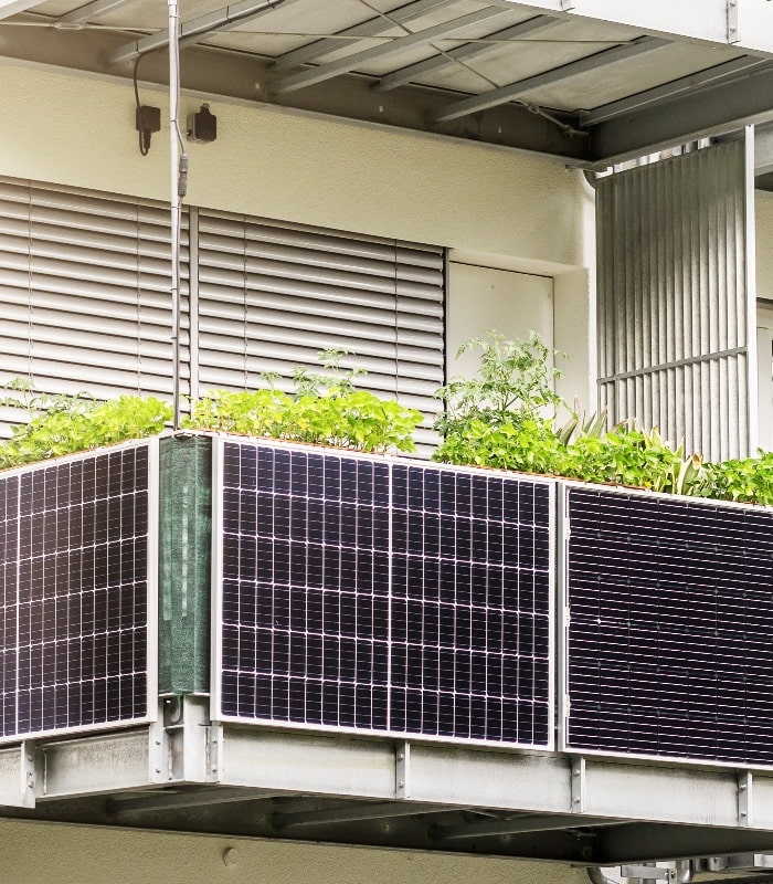 Solar Panels on Balcony of Apartment Building. Modern Balconies House with Solar Cells and Shutters, Blinds.